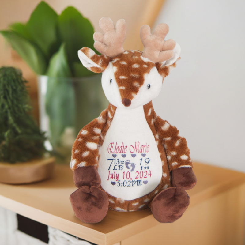 Deer stuffie with birth stats