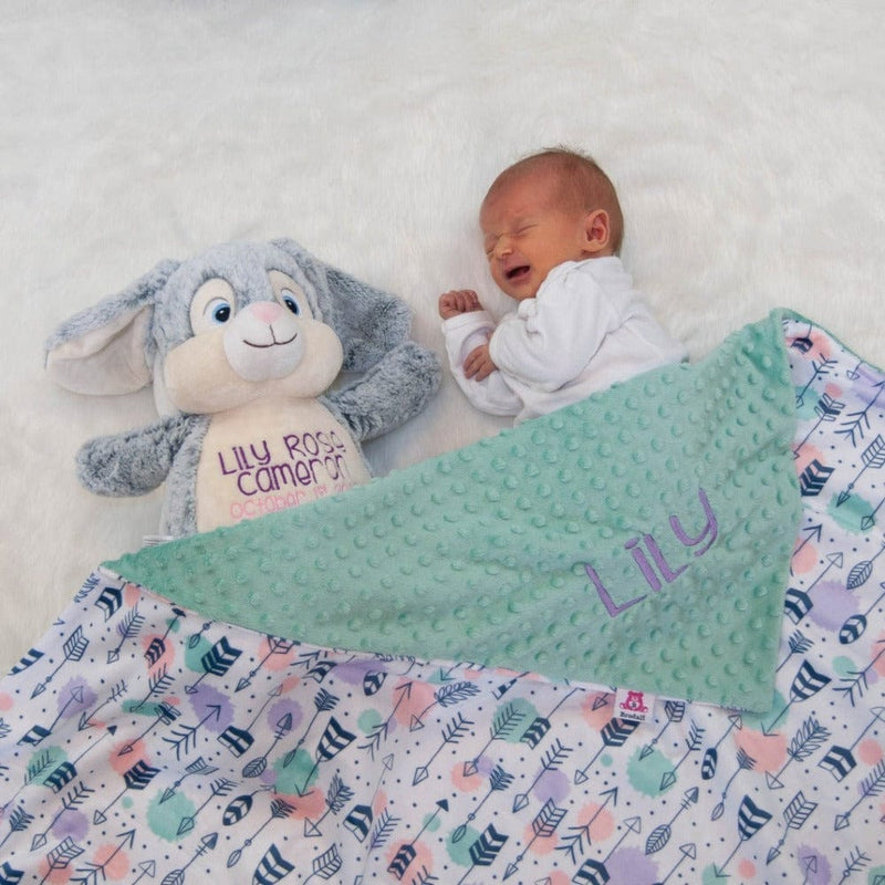 Baby girl with custom embroidered bunny and blanket